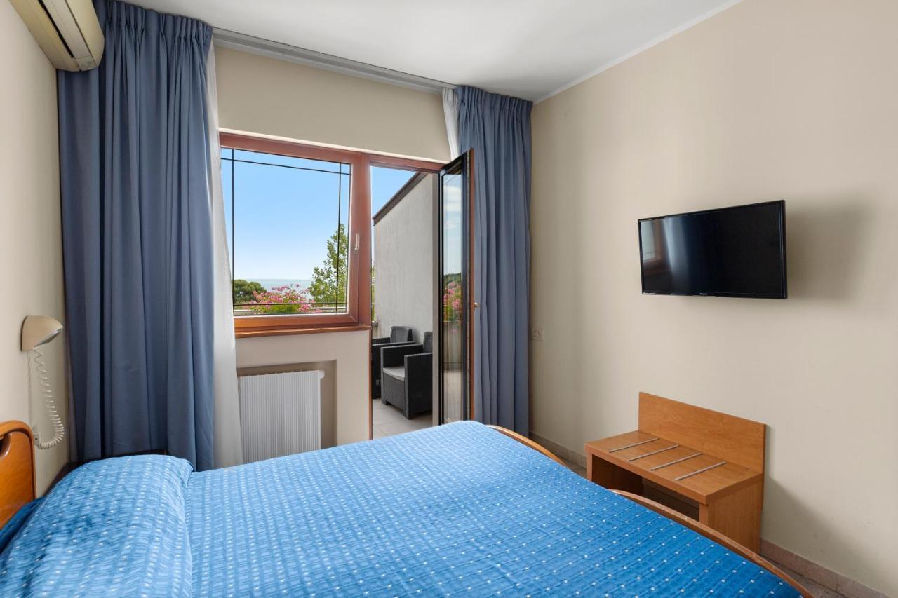 Hotel Ai Sette Nani ซิสเตียนา ภายนอก รูปภาพ